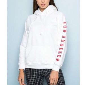 Brandy Melville white sweatshirt with red detailing